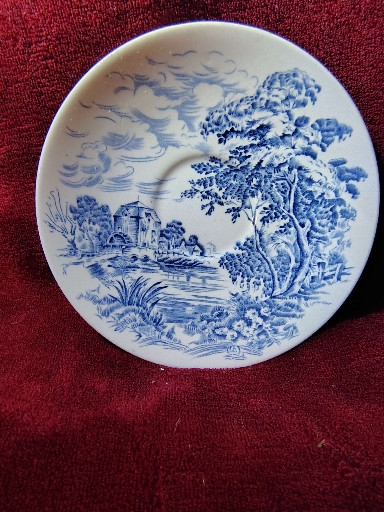 Ceramic plate in 'Countryside Blue' pattern by Enoch Wedgwood