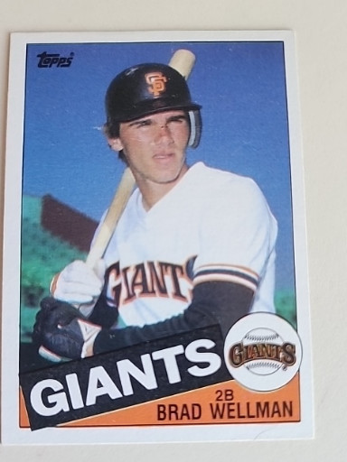 1985 Topps baseball card #409 featuring Brad Wellman, San Francisco Giants