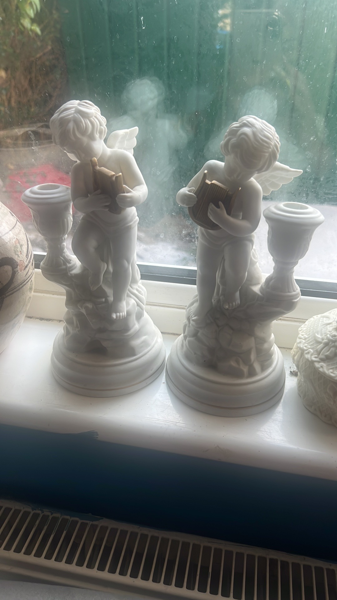 Porcelain candlestick holders titled 'Amorini Di Pompei' by Gianni Benvenuti for Franklin Mint