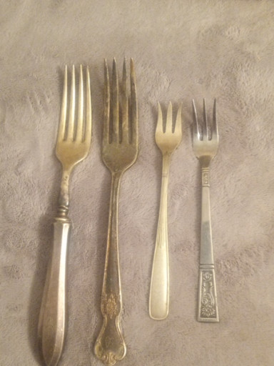 Silverplate forks, mixed patterns by Holmes & Edwards, Rogers Bros. 1847, and Community Silver