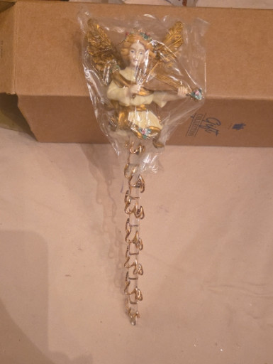Acrylic and resin Christmas ornament titled 'Sparkling Angel Icicle' by Avon