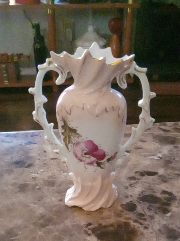 Porcelain vase with hand-painted floral decoration and ornate handles