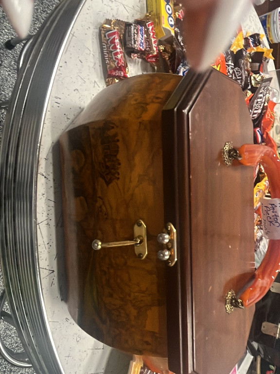 Wooden tea caddy with brass lock and key, featuring burled walnut veneer
