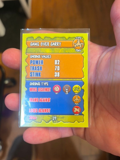 Trading card titled 'Game Over Garry' from The Garbage Gang series