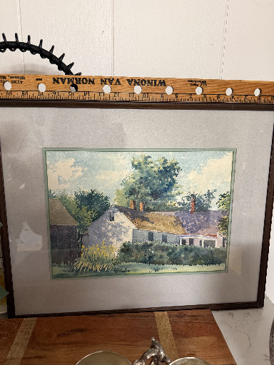 Watercolor painting depicting a rural cottage with garden
