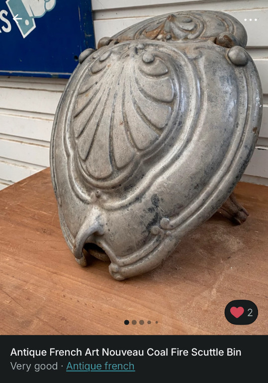 Cast iron coal scuttle in Art Nouveau style with turtle shell design