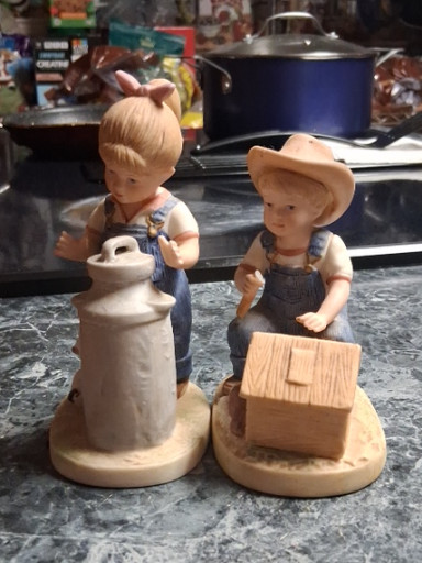 Porcelain figurine titled 'Morning Chores' (Debbie #1501) from the Denim Days collection by HOMCO