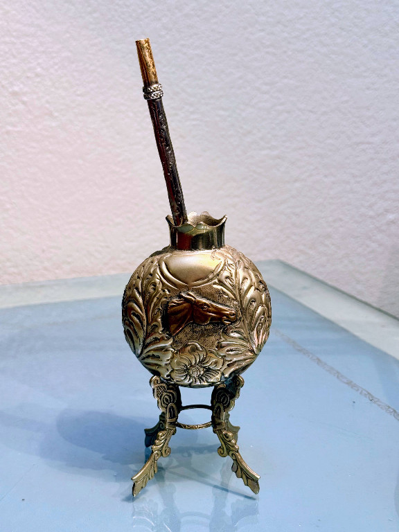 Silver-plated alpaca metal mate gourd with bombilla straw on footed stand, Argentina