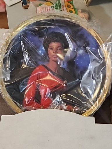 Porcelain commemorative plate titled 'Lieutenant Uhura' from the Star Trek 25th Anniversary Collection by Hamilton Collection, artwork by Thomas Blackshear