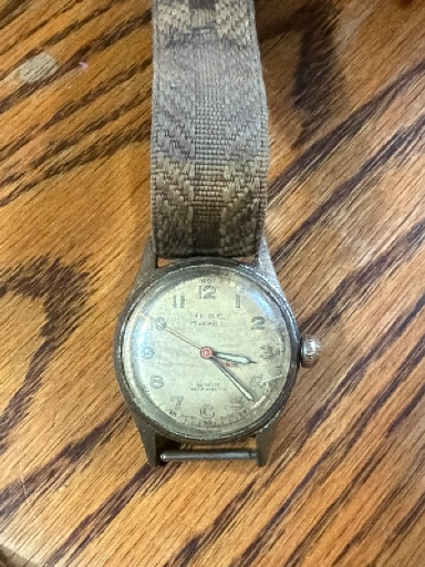 Vintage stainless steel military-style wristwatch by Delbana with manual wind movement