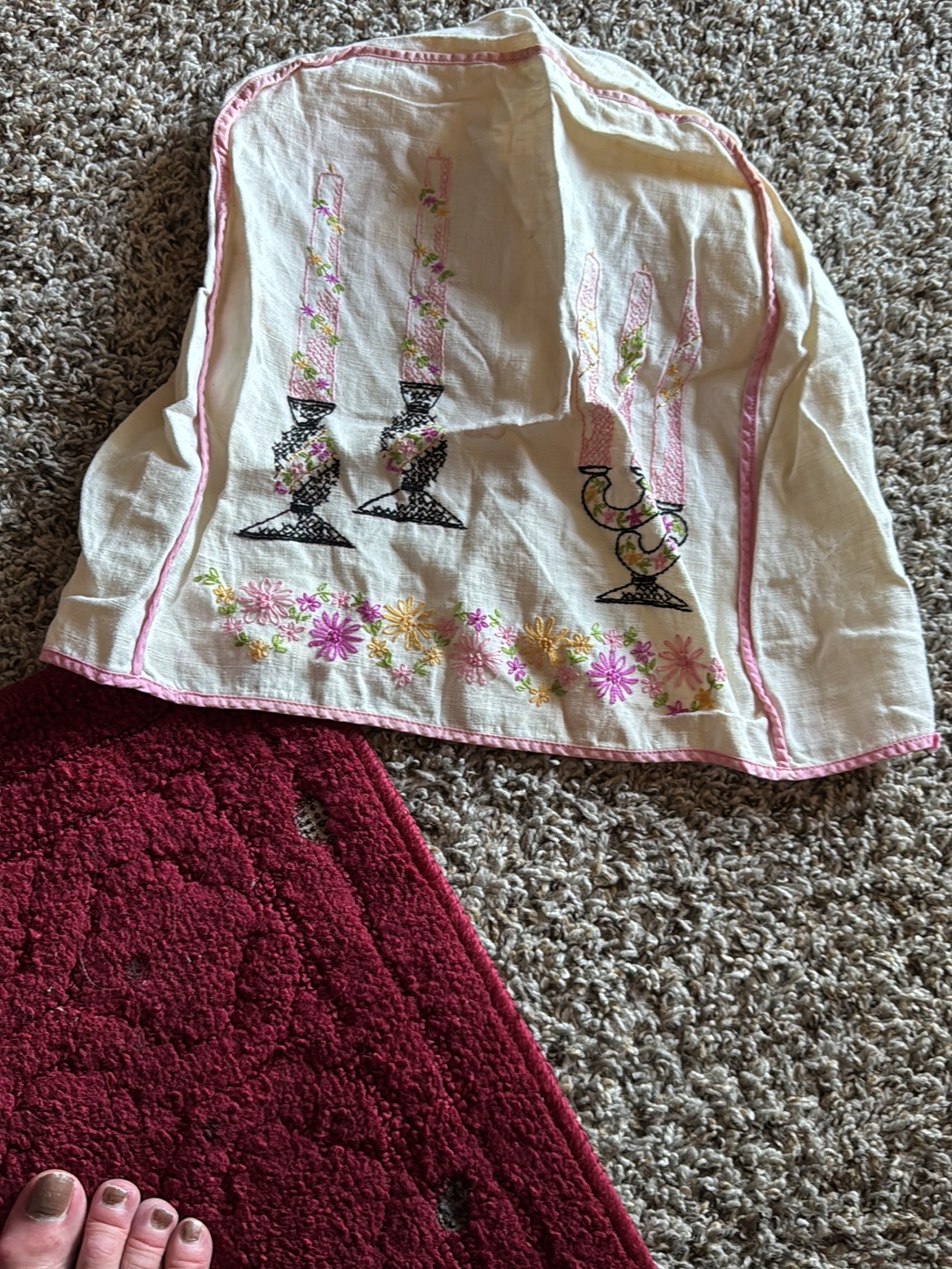 Linen textile with embroidered candelabra design