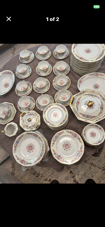 Porcelain dinnerware set with floral pattern by Theodore Haviland