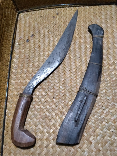 Vintage Filipino Talibon knife with wooden handle and sheath