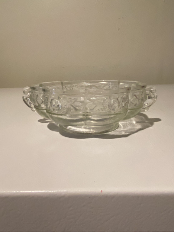 Pressed glass bowl with 'Aztec Rose' pattern by Jeannette Glass Company