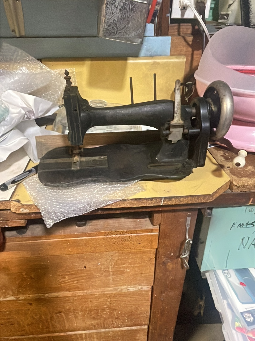 Cast iron antique sewing machine, likely White Family Rotary or similar model