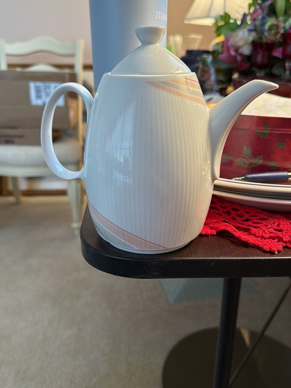Porcelain teapot with ribbed texture and pink accent band by Hasami Ware
