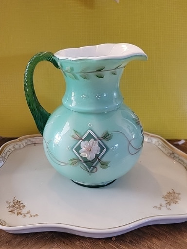 Hand-painted glass pitcher from Fenton's 75th Diamond Jubilee Celebration collection