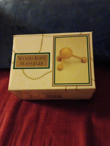 Wooden handheld body massager with rolling balls