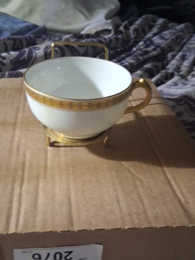 Porcelain double-handled bouillon cup with gold trim by Haviland Limoges