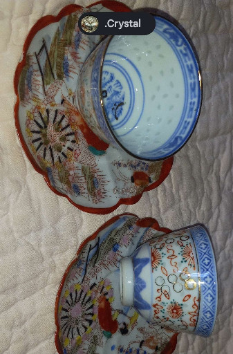 Hand-painted Japanese porcelain teacup and saucer set with Geisha and landscape motifs