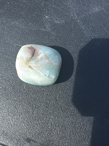 Polished larimar gemstone specimen