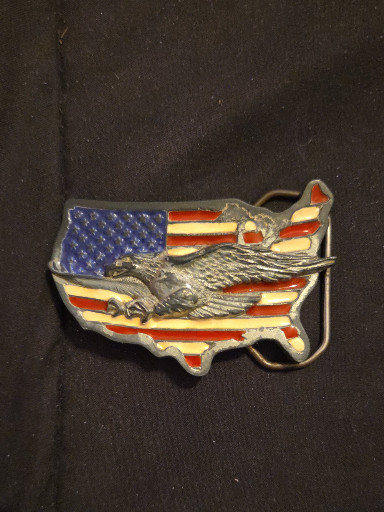 Metal belt buckle with enameled American flag and eagle design