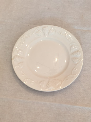 Set of 11 ironstone plates with embossed grape pattern by Red Cliff