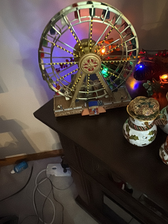 Metal musical ferris wheel model titled 'World's Fair Ferris Wheel' by Mr. Christmas Gold Label Collection