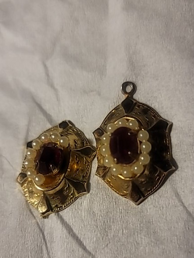 Victorian-era gold pierced earrings with garnets