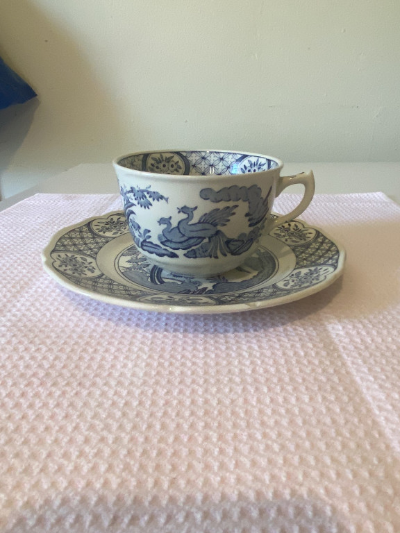 Porcelain teacup and saucer in 'Old Chelsea' blue and white pattern by Furnivals Ltd.