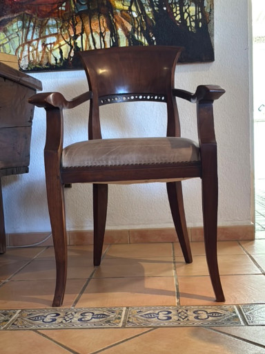 Mahogany armchair with sabre legs and genuine leather upholstered seat, circa early 19th century
