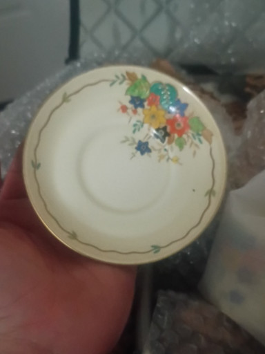 Porcelain saucer with floral decoration by Homer Laughlin