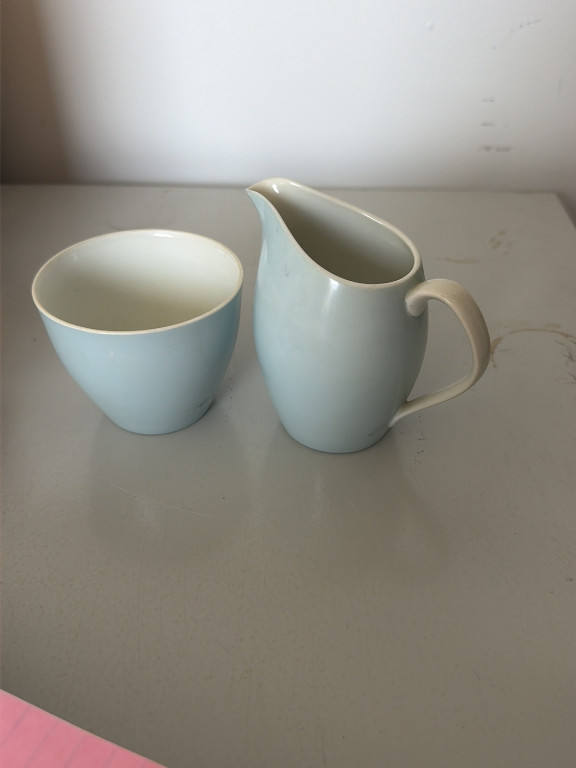 Porcelain creamer and sugar bowl set in pale blue glaze