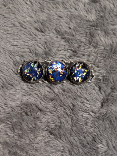 Sterling silver bar brooch with three blue opal glass cabochons