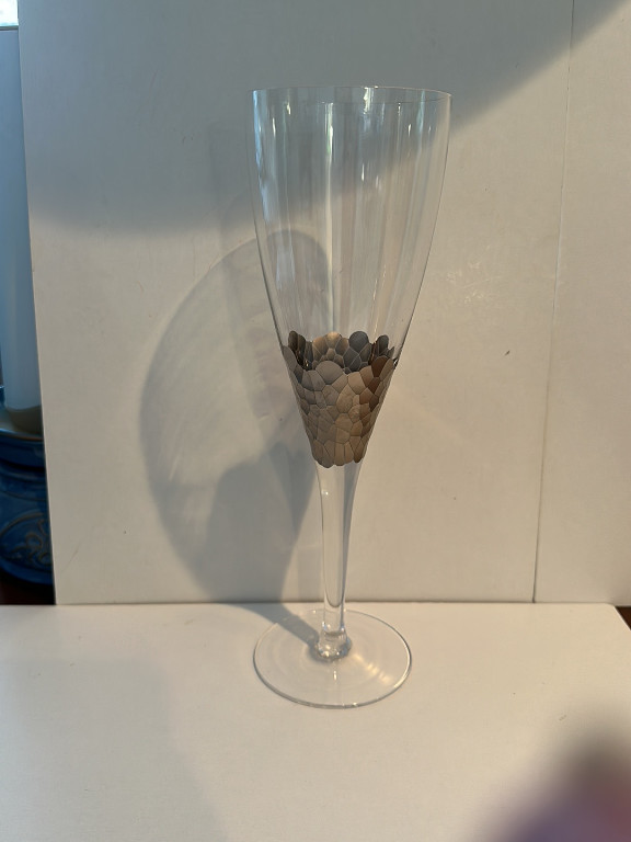 Glass champagne flute with metallic paillette decoration by Kim Seybert