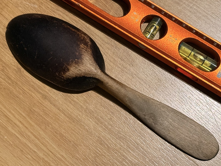 Hand-carved wooden serving spoon