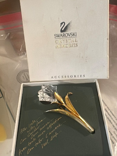 Gold-plated metal and crystal brooch titled 'Flower Brooch' by Swarovski Crystal Memories