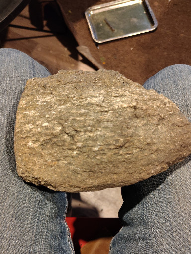 Stone tool or artifact, possibly a prehistoric chopper or hammerstone