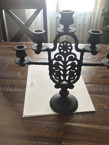 Cast iron five-light candelabra designed by Hugo Berger for Goberg