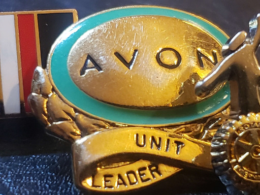 Metal and enamel lapel pin 'Unit Leader' by Avon
