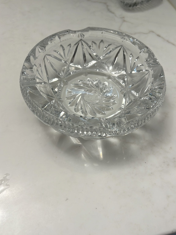 Cut crystal glass ashtray with starburst pattern