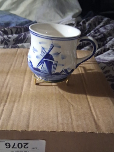 Ceramic mug with hand-painted Delft blue windmill design by D.A.I.C. (Dutch American Import Company)