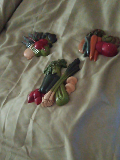 Set of three molded plastic vegetable wall plaques by Home Interiors