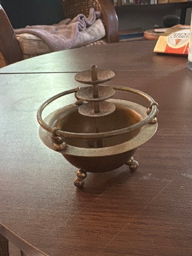 Art Deco metal smoking stand with tiered ashtray and ball feet