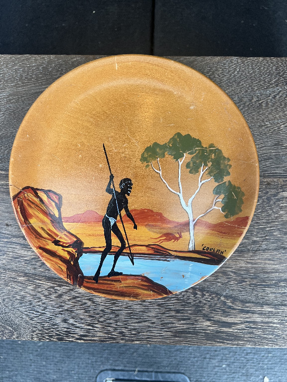Hand-painted wooden plate depicting Aboriginal figure, signed by Bill O'Neil
