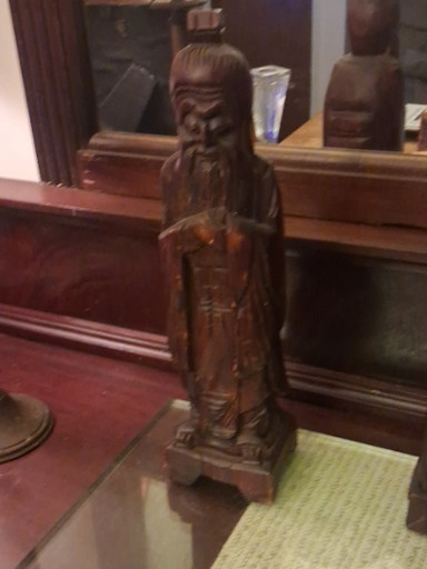 Carved wood statue of a Chinese sage or immortal