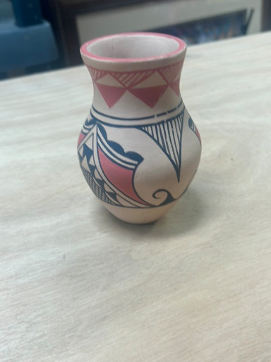 Ceramic pottery vase with traditional bird and geometric designs by Jemez Pueblo artist
