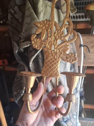 Brass double candle wall sconce with flower basket design