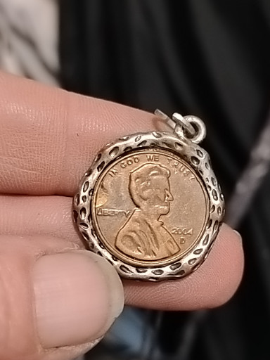 Sterling silver rope-edge bezel pendant with encased Lincoln penny