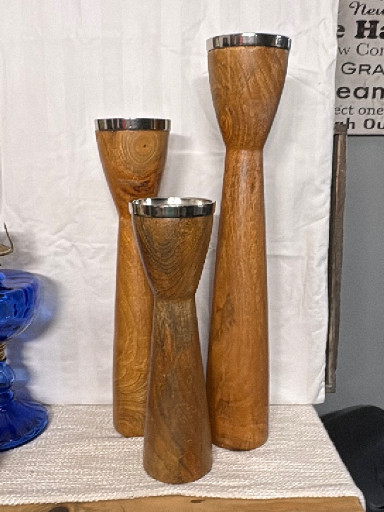 Set of three turned wood candlesticks with metal inserts